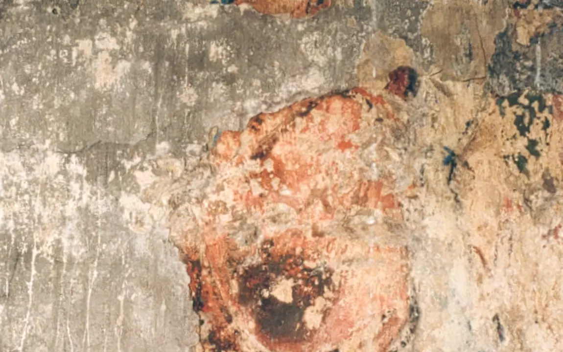 De figuur rechts van Christus