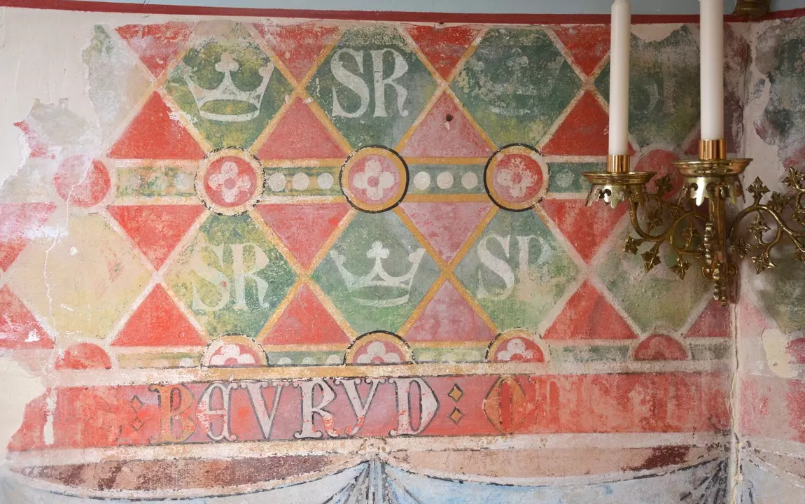 De muurschildering in de kapel na conservatie